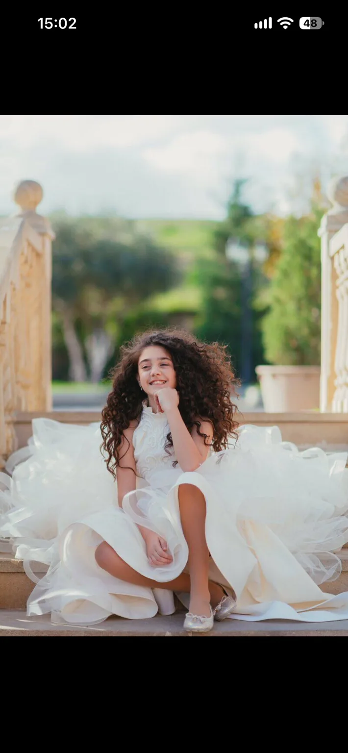 White tulle dress on the steps