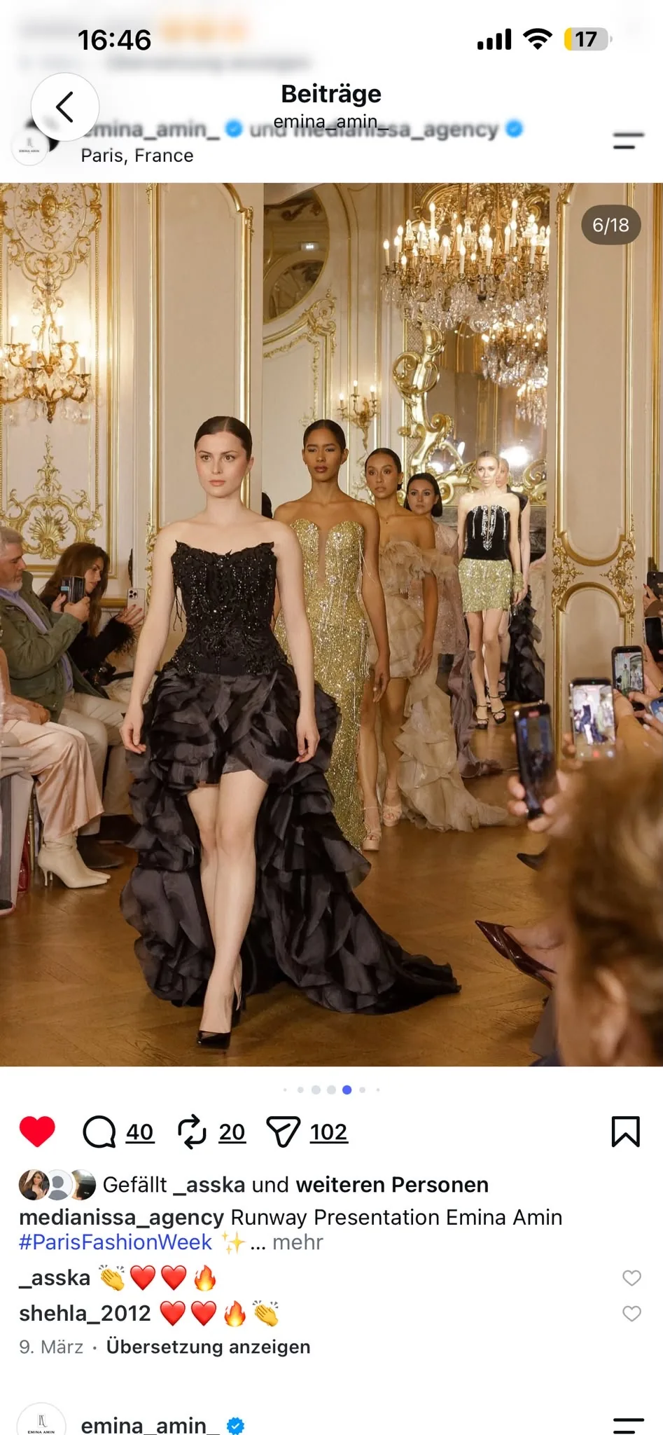 Black ruffled couture gown leading the runway finale