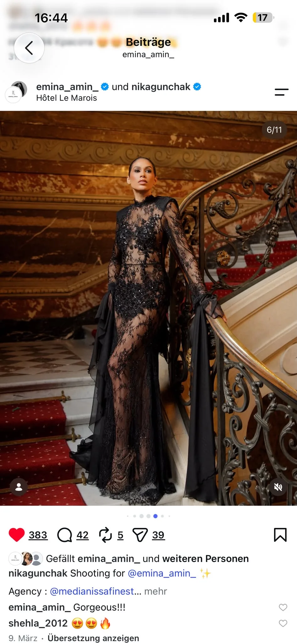 Black lace evening gown beside the ornate staircase